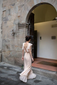 Woman entering in building