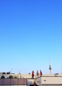 Low angle view of building against clear blue sky