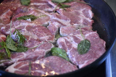 Close-up of meat in cooking pan