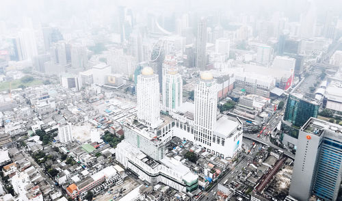 High angle view of modern buildings in city