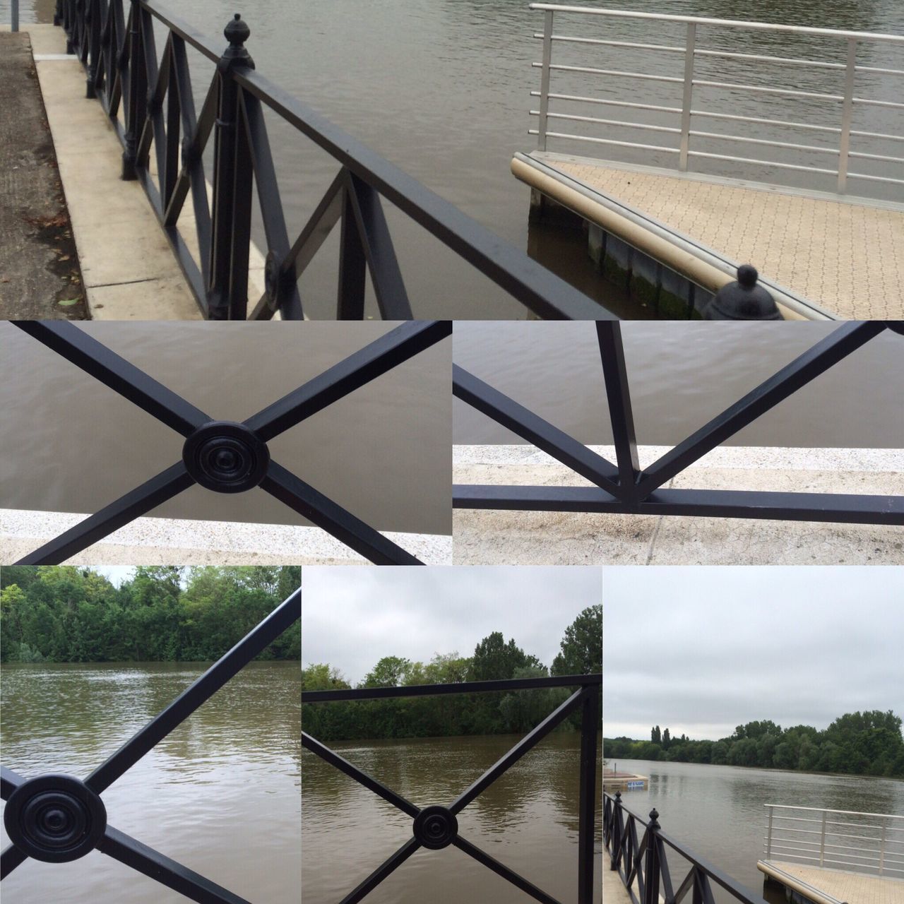 FOOTBRIDGE OVER RIVER WITH BUILDINGS IN BACKGROUND