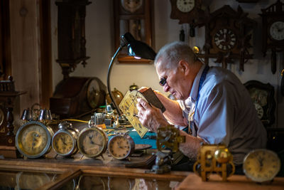 Man having food in kitchen