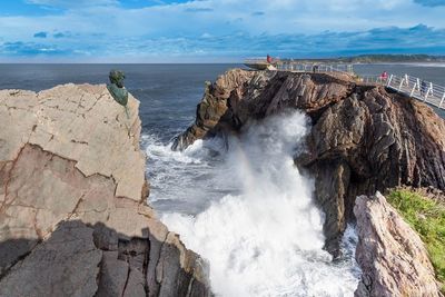 Panoramic view of sea shore against sky