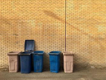 Garbage against blue wall