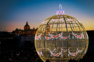 Illuminated dome against sky at night