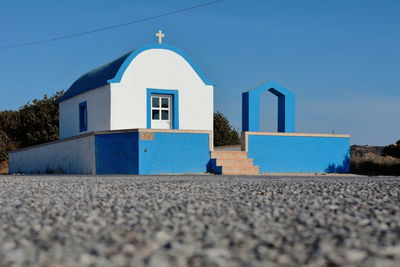 Surface level of building against blue sky