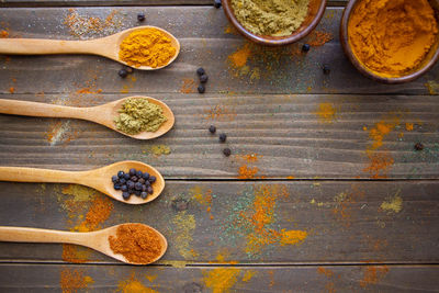 High angle view of chopped vegetables on wooden floor