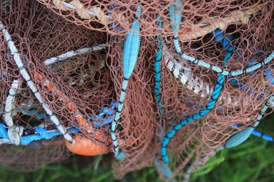 Close-up of fishing net at harbor