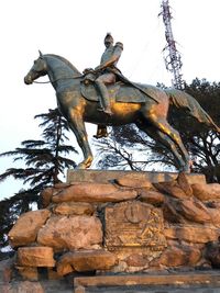 Low angle view of statue against clear sky