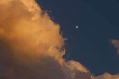 Low angle view of moon in sky