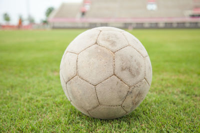 Close-up of ball on soccer field