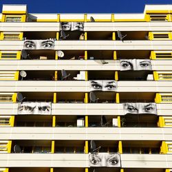 Low angle view of posters on building