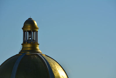 Low angle view of church against clear blue sky