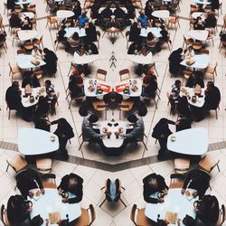 High angle view of people on table