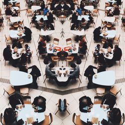 High angle view of people on table