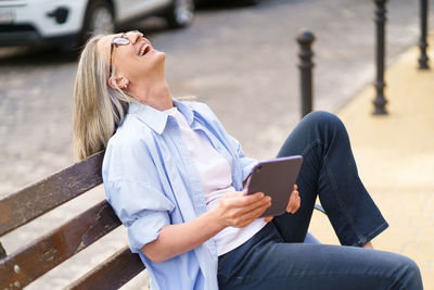 Young woman using mobile phone