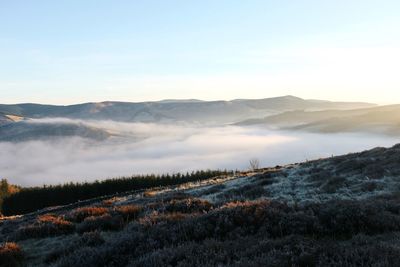 Scenic view of mountains against clear sky