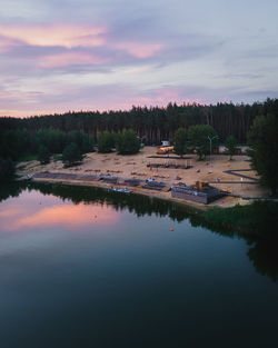Scenic view of lake against sky during sunset