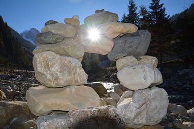 Rocks on mountain against clear sky