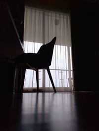 Empty chair on table at home
