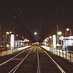 Illuminated street lights at night