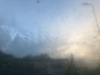 Low angle view of snow covered land