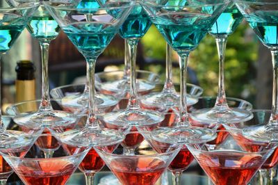 Close-up of wine glasses on table