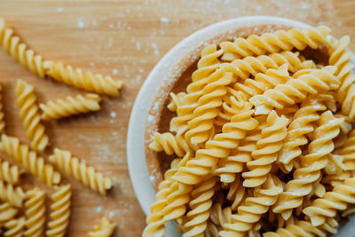 High angle view of pasta in container on table