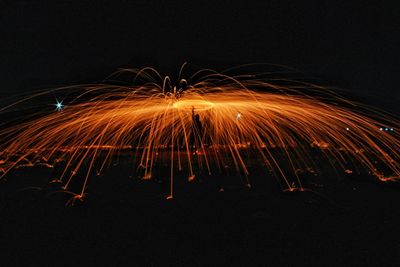 Firework display at night