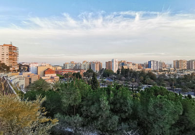 High angle view of buildings in city against sky