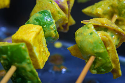 Close-up of green chili peppers