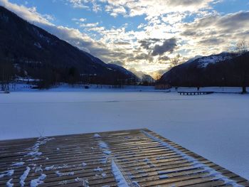 Scenic view of snow covered mountains against sky