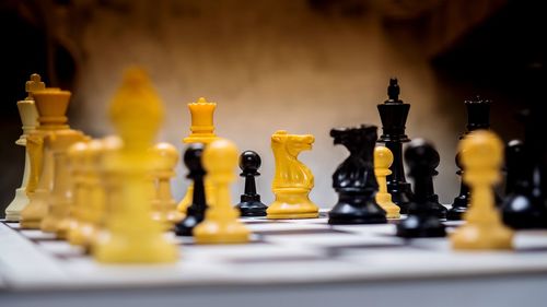 Close-up of chess board on table