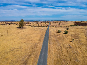 Aerial view of a country road in spring. drone view