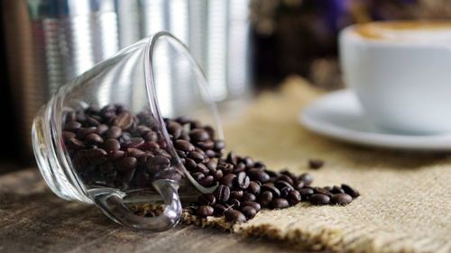 Close-up of coffee beans on table