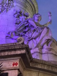 Low angle view of statue of historic building