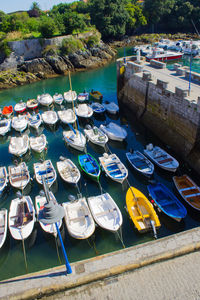 High angle view of boats moored in river