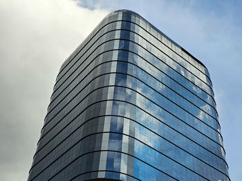 Low angle view of skyscraper against sky