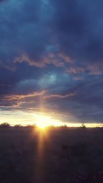 Low angle view of dramatic sky during sunset