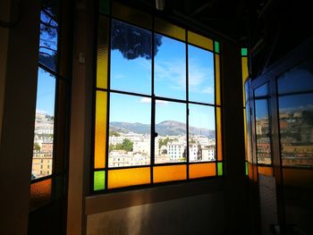 View of cityscape through window