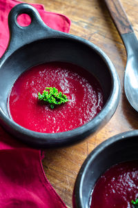 High angle view of strawberries in bowl on table