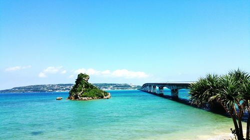 Scenic view of bridge between islands