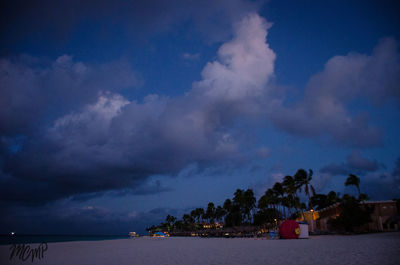 Scenic view of sea against sky at night