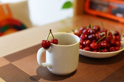 Close-up of fruits in bowl on table