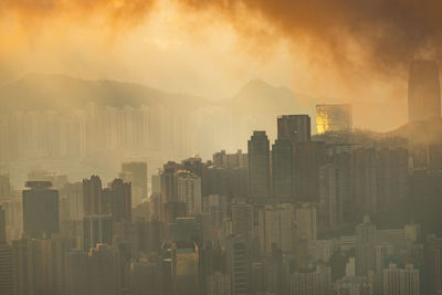 Modern buildings in city against sky