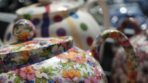 Close-up of multi colored candies on table