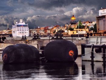 View of buildings against cloudy sky