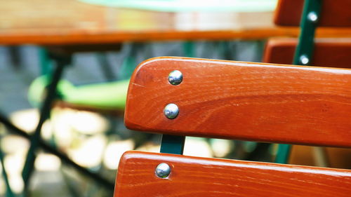 Close-up of empty bench on table