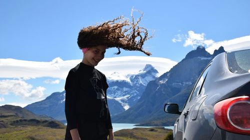 Woman looking at mountain landscape