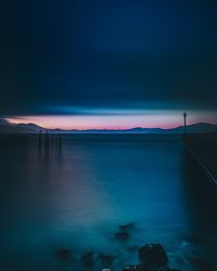 Scenic view of sea against sky at sunset